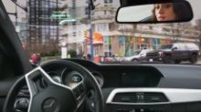 Iris replaces the car's existing driver's-side windshield visor